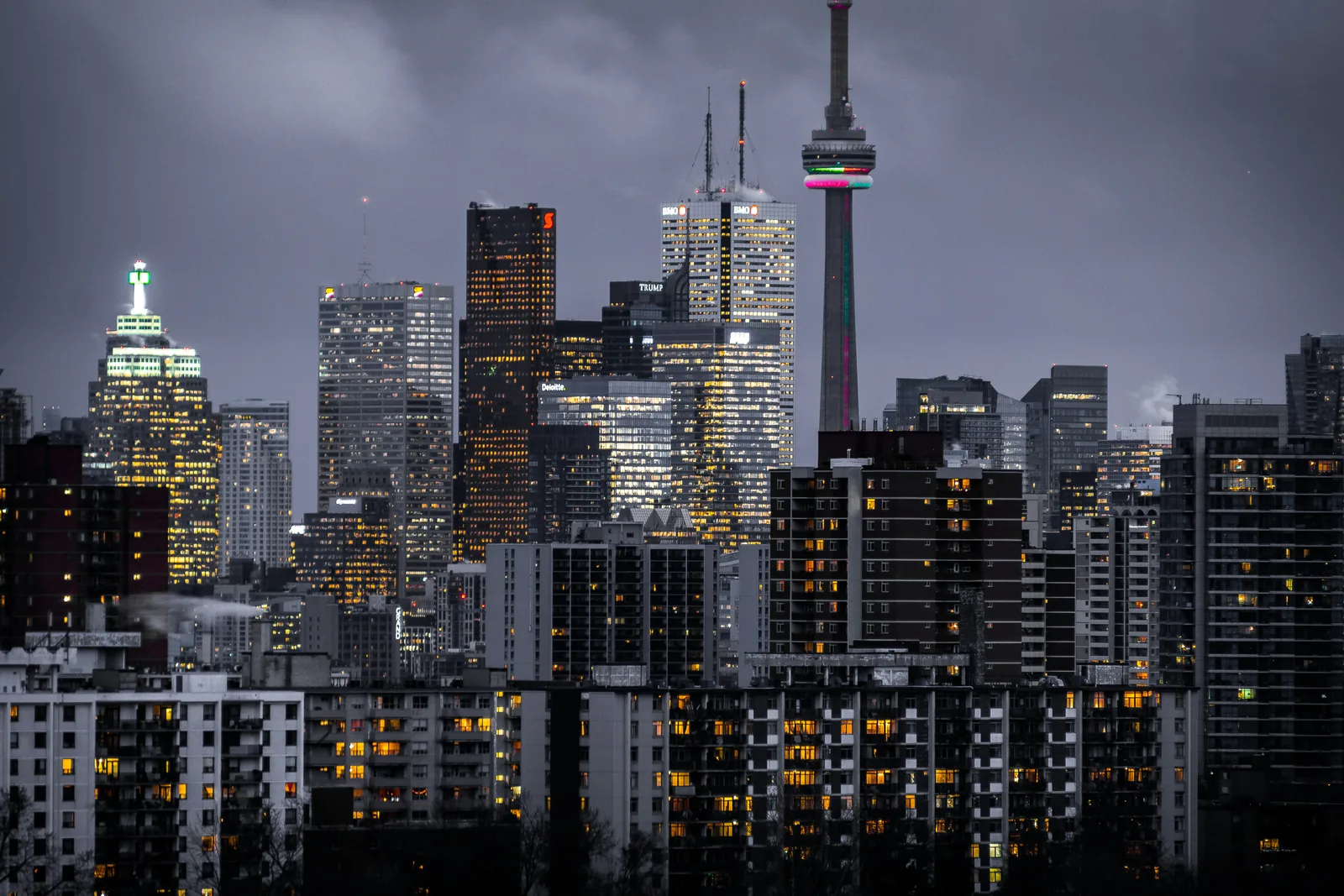 Toronto skyline with the CN Tower and illuminated buildings at dusk